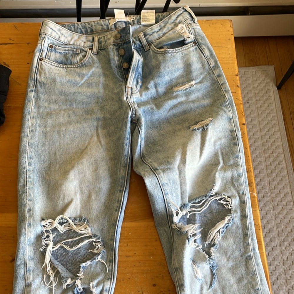 High waisted ripped jeans size 10. Never worn